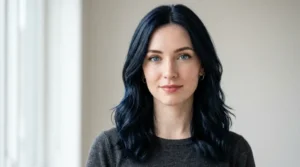 Blue-black hair on a woman with pale skin and blue eyes.