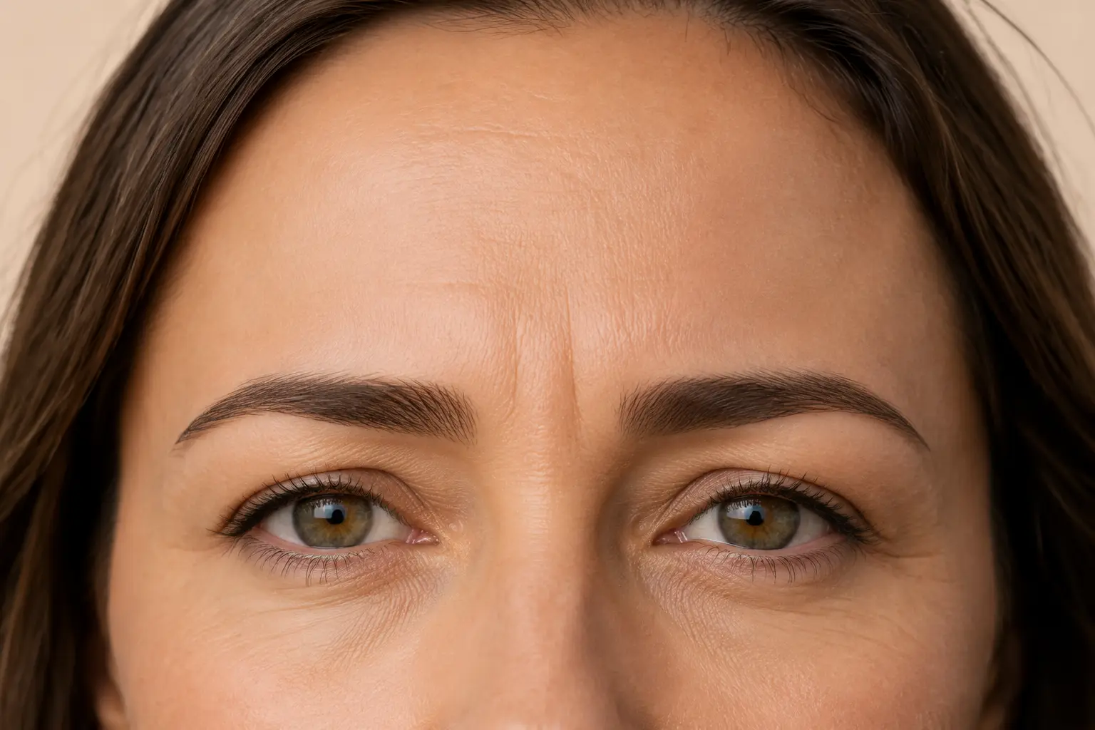 Close-up view of glabellar lines between the eyebrows