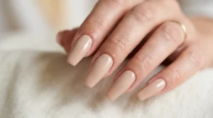 Close-up of coffin-shaped nails with tapered sides and flat tips