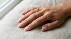 Close-up of oval-shaped nails with gently tapered sides and rounded tips