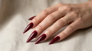 Close-up of long stiletto nails with sharply pointed tips