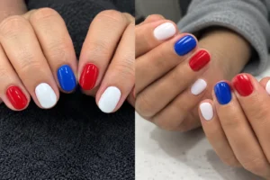 Two close-up views of short oval nails painted solid red, white, and cobalt blue.